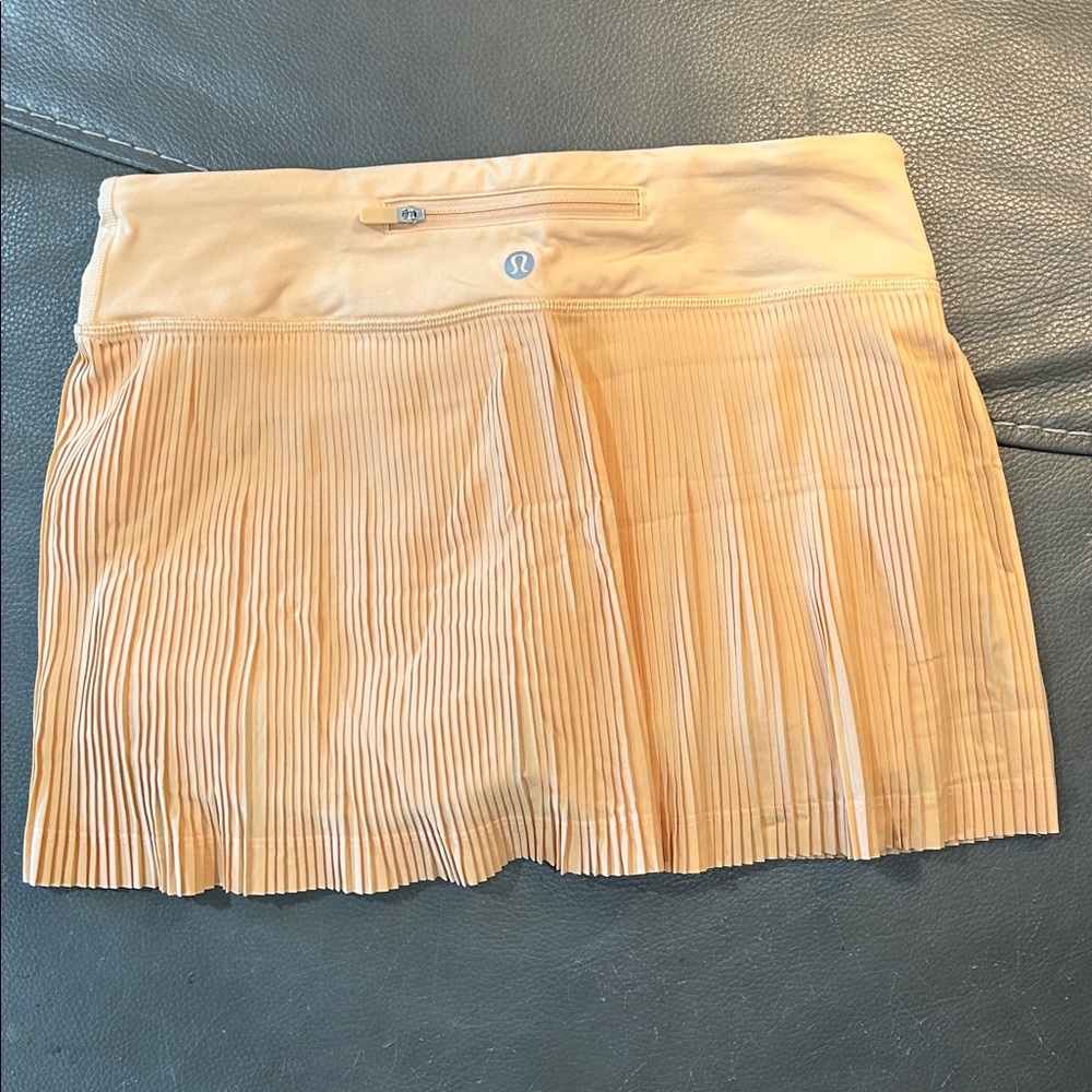 Lululemon Pleat to Street Mid-Rise Skirt in Summer Glow. Waist 28” - Picture 5 of 6